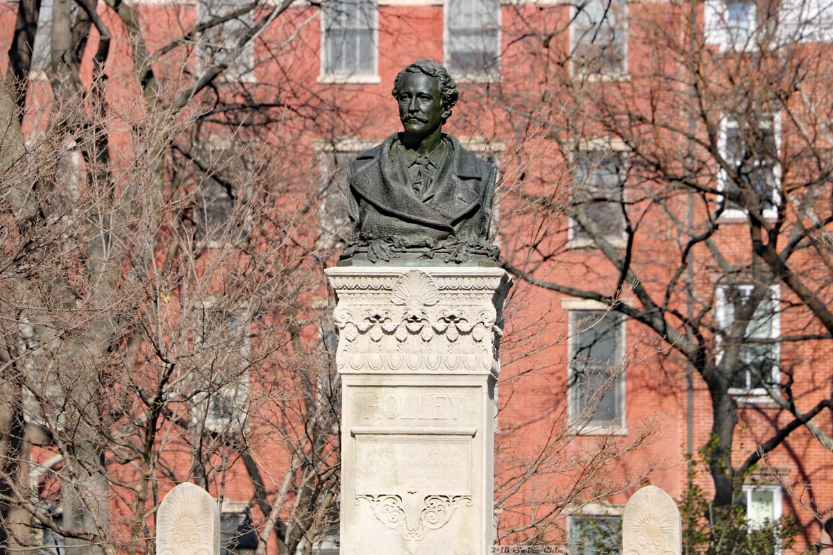 Bust of Alexander Lyman Holley in a quiet corner of Washington Square Park. By: Can Pac Swire